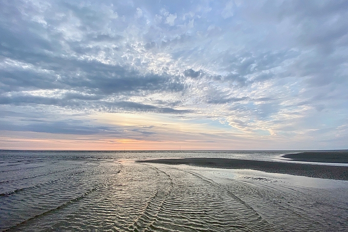 Wolkenhimmel wirkt wie gemalt