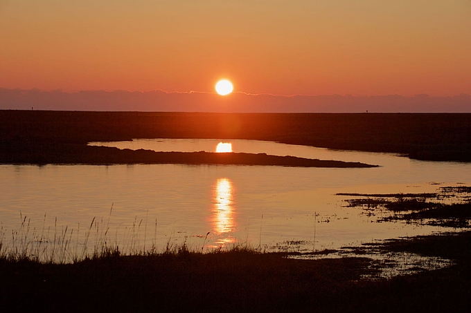 Sonnenuntergang mit Spiegelung