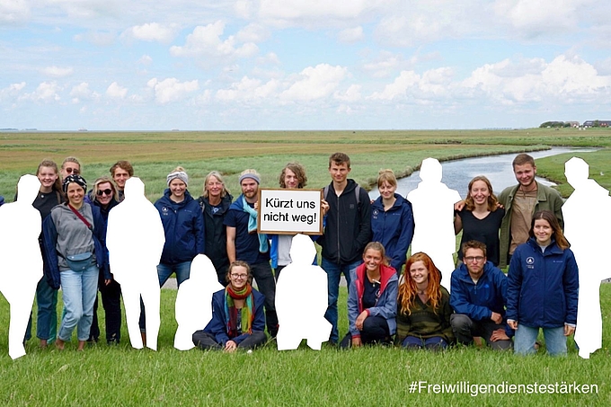 Gruppenbild mit mehreren herausgeschnittenen Freiwilligen