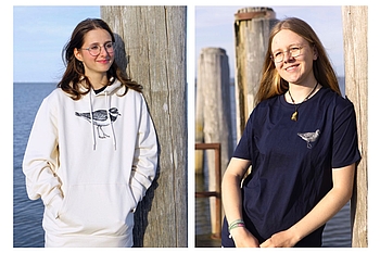 Freiwillige mit Pulli und T-Shirt
